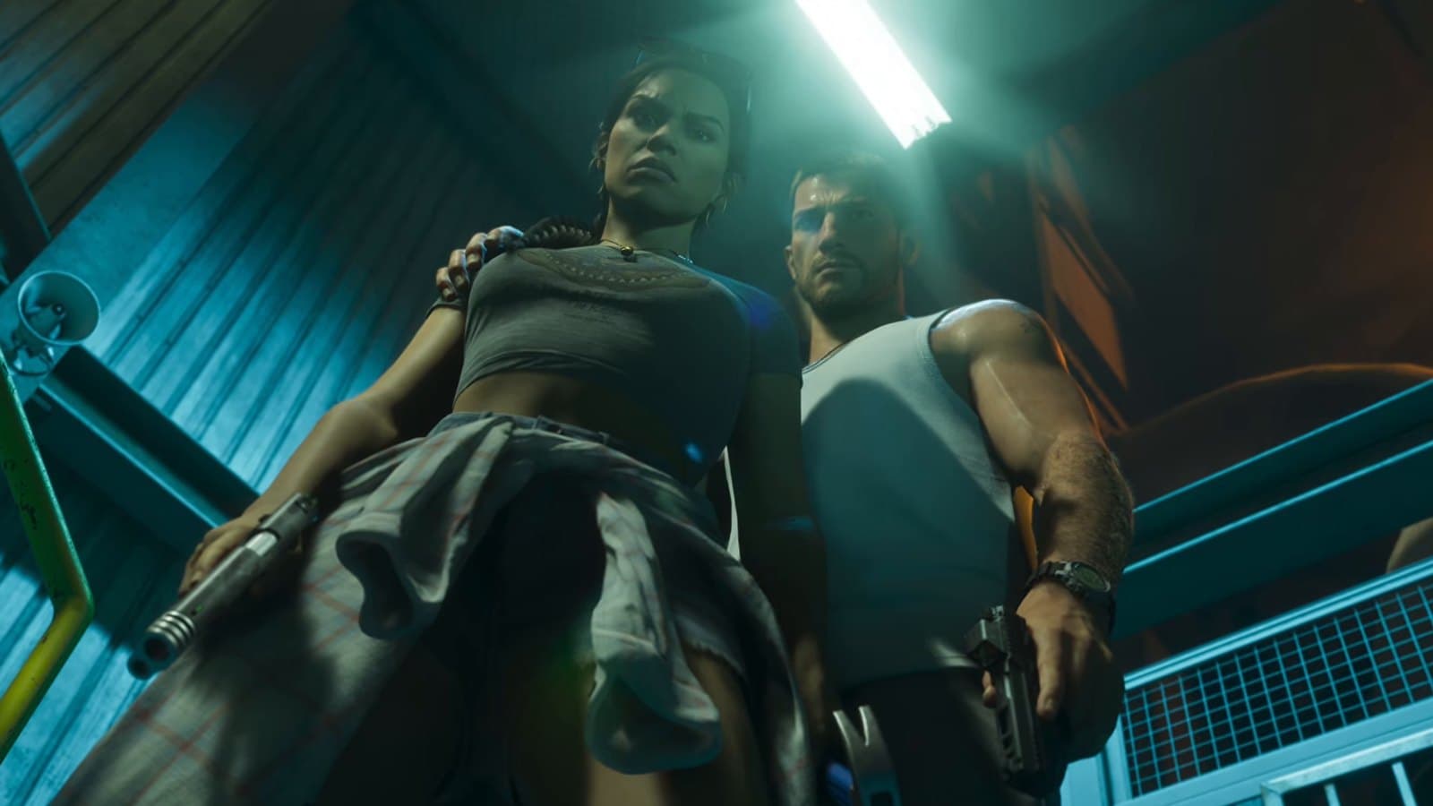 Jason and Lucia armed in a freight elevator